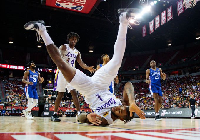 Jul 6, 2019; Las Vegas, NV, USA; Los Angeles Lakers guard Codi Miller-McIntyre reacts as he is upended against the Los Angeles Clippers during the NBA Summer League at Th