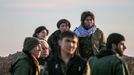 Fighters of the Kurdish People's Protection Units (YPG) gather on a frontline in the southern Ras al-Ain