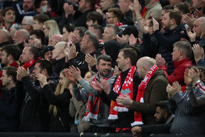 Soccer Football - Premier League - Liverpool v Manchester United - Anfield, Liverpool, Britain - April 19, 2022 Liverpool fans applaud on the seventh minute for Mancheste