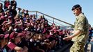 Britain's Prince Harry speaks to children from St Mary's South Public School during a visit to Sydney's Opera House in Australia