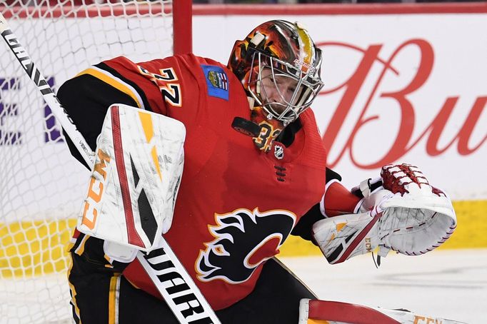 Mar 10, 2019; Calgary, Alberta, CAN; Calgary Flames goalie David Rittich (33) stops a shot from Las Vegas Golden Knights at Scotiabank Saddledome. Flames won 6-3. Mandato