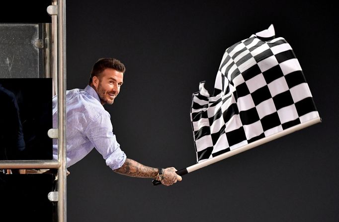 Formula One F1 - Bahrain Grand Prix - Bahrain International Circuit, Sakhir, Bahrain - March 31, 2019  David Beckham waves the chequered flag at the end of the race Andre