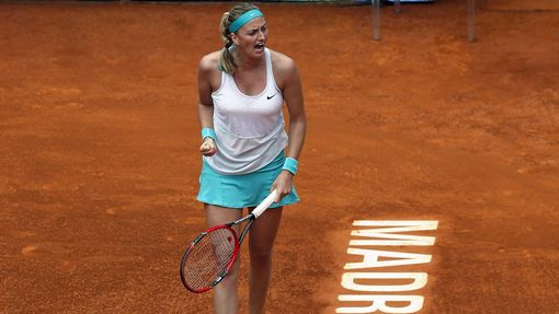 Kvitova of the Czech Republic celebrates after winning a point against Williams of the U.S. during their semi-final match at the Madrid Open tennis tournament in Madrid