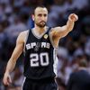 Spurs' Ginobili reacts after a basket against the Heat durin