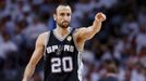 San Antonio Spurs' Manu Ginobili reacts after a basket against the Miami Heat during the second quarter in Game 7 of their NBA Finals basketball playoff in Miami, Florida