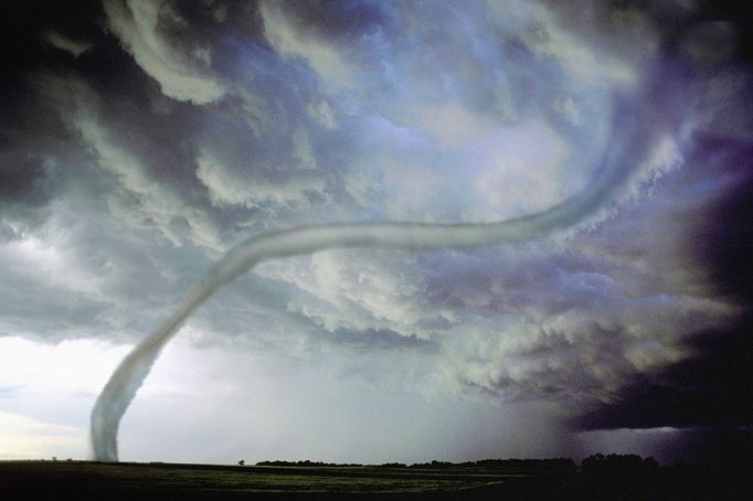 Ominus turbulent Wizzard of Oz like tornado on wicked looking sky located in the central plains Kan Rope tornado against ominous dark and stormy sky. Keywords Willett and Tornado to see all of my tornado producing storm images or keyword Lightningsmiths to see all of my severe weather images.