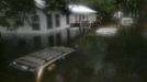 RNPS IMAGES OF THE YEAR 2012 - Three submerged cars sit in front of a flooded trailer in Live Oak, Florida, June 26, 2012. Tropical Storm Debby drifted slowly eastward over Florida's Gulf Coast on Tuesday, threatening to dump more rain on areas already beset by flooding. After stalling in the Gulf of Mexico, the storm was finally moving but was expected to take two more days to finish its wet slog across Florida. Picture taken June 26, 2012. EDITORS NOTE: Moisture on the lens. REUTERS/Phil Sears (UNITED STATES - Tags: ENVIRONMENT DISASTER TPX IMAGES OF THE DAY) Published: Pro. 5, 2012, 11:15 odp.