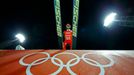 Switzerland's Ammann takes off from the ski jump during the men's ski jumping individual normal hill training event of the Sochi 2014 Winter Olympic Games in Rosa Khutor