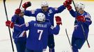 France's Julien Desrosiers (L) celebrates his goal against the Czech Republic with team mates during the first period of their men's ice hockey World Championship Group A