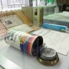 A STASI-built can of sausages with a fake bottom, for smuggling cash or microfilms, is on display at the documentation centre of the former east Germany's Ministry for State Security, better known by its acronym STASI, in Berlin 07 November 2006. The exhibition explains spying techniques and ideology of the infamous east German secret police, which at its height employed eighty-five-thousand agents and more than one-hundred-thousand informers to oversee almost every aspect of life in communist East Germany. AFP PHOTO JOHN MACDOUGALL