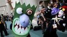 Brandon Moriesta interacts with a Cosplay character at the 2015 Comic-Con International in San Diego