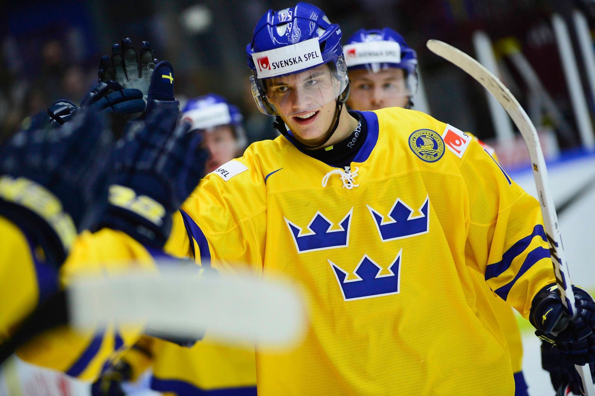 Sweden celebrates goal against Norway during IIHF game in Malmo