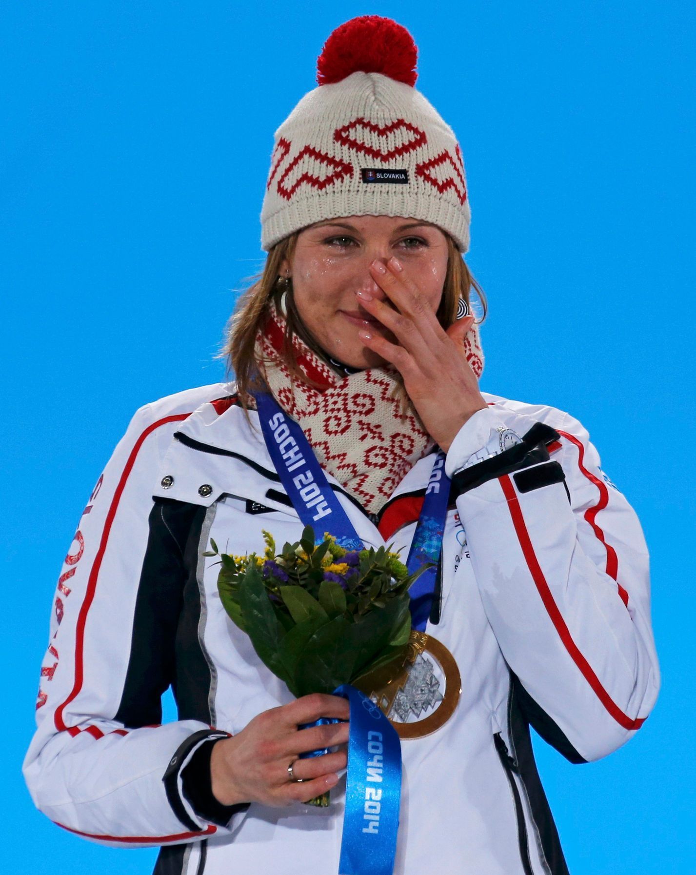 Gold medalist Anastasiya Kuzmina during the medal ceremony for the women's biathlon 7.5km sprint event at the Sochi 2014 Winter Olympics