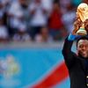 FILE PHOTO: Brazilian soccer legend Pele holds the World Cup trophy during the World Cup 2006 opening ceremony in Munich