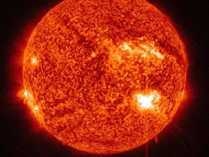 Sunspot 1515 Release M6.1 Solar Flare Huge sunspot AR1515 has released another M-class flare this morning. At 7:39am EDT the active region released an M6.1 class flare which peaked five minutes later. This image, taken by the Solar Dynamics Observatory (SDO), is shown in the 304 Angstrom wavelength, which is typically colorized in red and focuses on Helium in the chromosphere and transition region of the sun. Credit: NASA/SDO/AIA