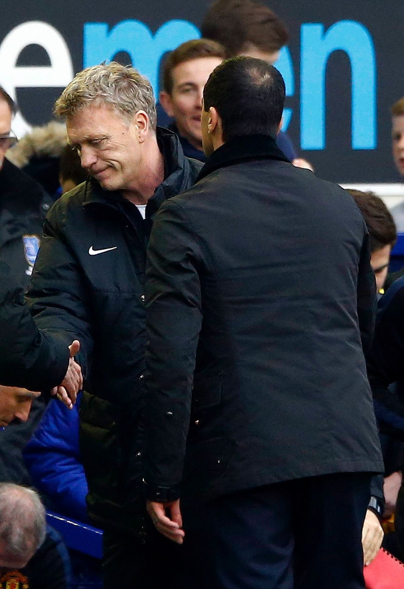 Everton manager Roberto Martínez shakes hands with Manchester United manager David Moyes after their English Premier League soccer match in Liverpool