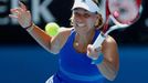 Angelique Kerber of Germany hits a return to Alla Kudryavtseva of Russia during their women's singles match at the Australian Open 2014 tennis tournament in Melbourne Jan