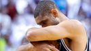 San Antonio Spurs' Tim Duncan hugs the ball before the Spurs take on the Miami Heat in Game 7 of their NBA Finals basketball playoff in Miami, Florida June 20, 2013. REUT