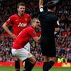 Manchester United's Vidic is sent off by referee Clattenburg during their English Premier League soccer match against Liverpool in Manchester