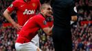 Manchester United's Vidic is sent off by referee Clattenburg during their English Premier League soccer match against Liverpool in Manchester