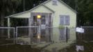 A flooded home along Duval Street is pictured in Live Oak, Florida, June 26, 2012. Tropical Storm Debby weakened to a tropical depression after it drifted ashore on Florida's Gulf Coast on Tuesday, even as it dumped more rain on flooded areas and sent thousands of people fleeing from rising rivers. Picture taken July 26. REUTERS/Phil Sears (UNITED STATES - Tags: DISASTER ENVIRONMENT) Published: Čer. 27, 2012, 1:38 odp.