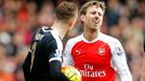 Arsenal's Nacho Monreal reacts after fouling Leicester's Jamie Vardy as a penalty is awarded to Leicester