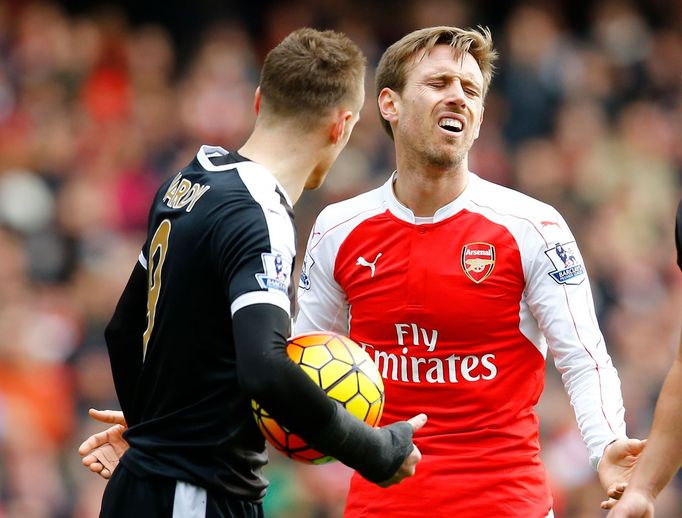 Arsenal's Nacho Monreal reacts after fouling Leicester's Jamie Vardy as a penalty is awarded to Leicester