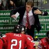 Switzerland's head coach Hanlon talks with Fiala during their Ice Hockey World Championship game against Canada at the O2 arena in Prague