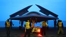 US Navy Launches Drone May 14, 2013 - Virginia Coast, Virginia , U.S. - An X-47B is towed into the hangar bay of the aircraft carrier USS George H.W. Bush. George H.W. Bush is the first aircraft carrier to successfully catapult launch an unmanned aircraft from its flight deck.