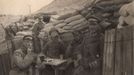 German officers sit outside dugouts on the Yser Front in Belgium in this 1917 handout picture.