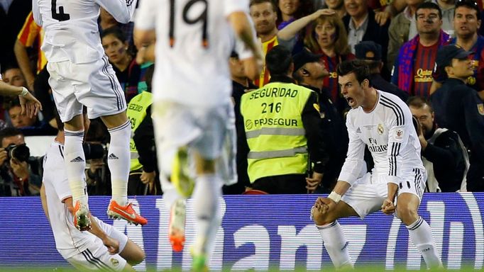 Real Madrid's Gareth Bale celebrates his goal during their King's Cup final soccer match against Barcelona's at Mestalla stadium in Valencia