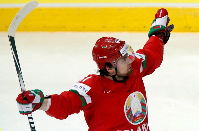 Alexei Ugarov of Belarus celebrates his goal against Germany during the second period of their men's ice hockey World Championship Group B game at Minsk Arena in Minsk Ma