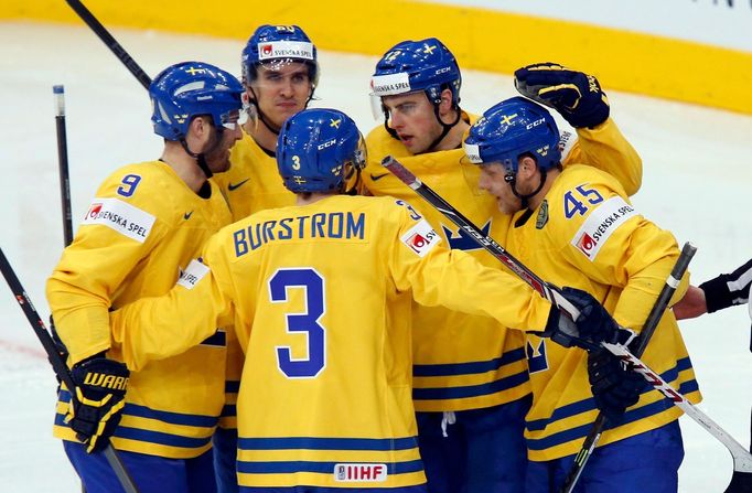 Sweden's Joakim Lindstrom (2nd R) celebrates his goal against the Czech Republic with team mates during the first period of their men's ice hockey World Championship bron