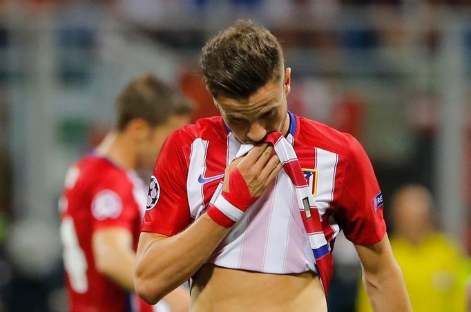 Atletico Madrid's Saul Niguez looks dejected