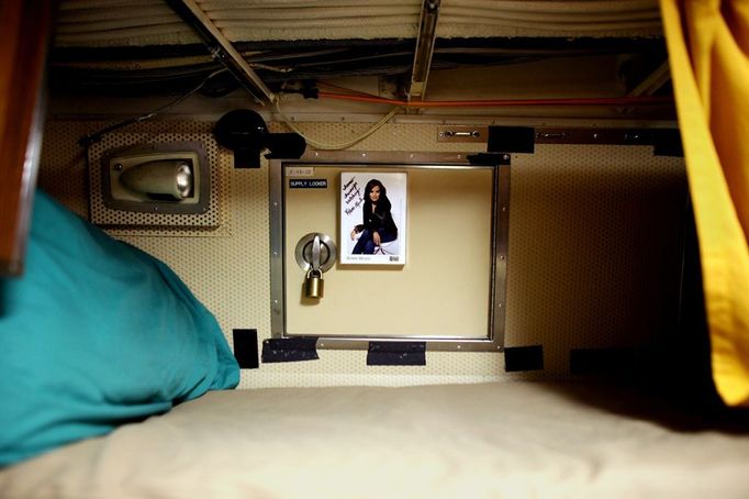 April 24, 2011 - Cape Canaveral, Florida, U.S. - -- Cape Canaveral, Fla. -- A signed photo of Robin Meade, of CNN Headline News, hangs in a submariner's rack on the USS Annapolis (SSN 760), a S6G nuclear reactor powered fast attack submarine, sailing from Cape Canaveral on Sunday. The USS Annapolis measures 362 ft. in length and 33 ft. at the beam, a diving depth of over 400 ft., 27+ mph, 12 vertical launch missile tubes, 4 torpedo tubes, and a crew of 130 enlisted submariners. The submarine was commissioned April 11, 1992 with its homeport in Groton, Connecticut. USS Annapolis sailed to the 21st Anniversary of Fleet Week at Port Everglades, Fort Lauderdale. (Credit Image: © Gary Coronado/The Palm Beach Post)