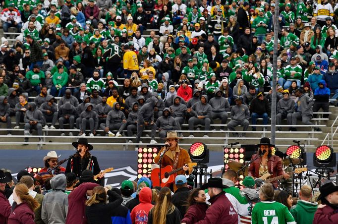 Jan 1, 2020; Dallas, TX, USA; Midland performs before the 2020 Winter Classic hockey game between the Dallas Stars and the Nashville Predators at Cotton Bowl Stadium. Man