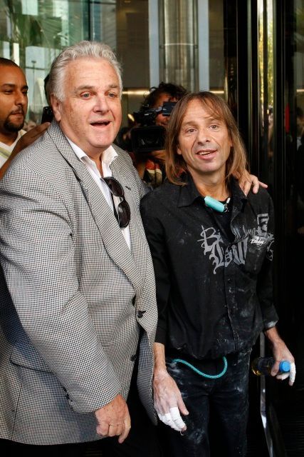 Francouzský horolezec Alain Robert, známý jako Spiderman