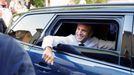 French President Emmanuel Macron reacts from his car as he meets residents of Beaumes-de-Venise during a one-day trip focused on the reform of vocational high schools Sou