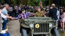 World War Two veterans are greeted by a crowd at the 3rd Infantry Division Old Hickory memorial ceremony ahead of the 75th anniversary of the Normandy