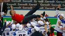 Russia's head coach Oleg Znarok is thrown in the air by his players as they celebrate winning their men's ice hockey World Championship final game against Finland at Mins