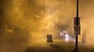 A man rides a cycle rickshaw amid a cloud of anti-mosquito smoke near the banks of the river Ganges ahead of the "Kumbh Mela" (Pitcher Festival) in the northern Indian city of Allahabad January 11, 2013. During the festival, Hindus take part in a religious gathering on the banks of the river Ganges. "Kumbh Mela" will return to Allahabad in 12 years. REUTERS/Ahmad Masood (INDIA - Tags: RELIGION SOCIETY) Published: Led. 11, 2013, 6:46 odp.