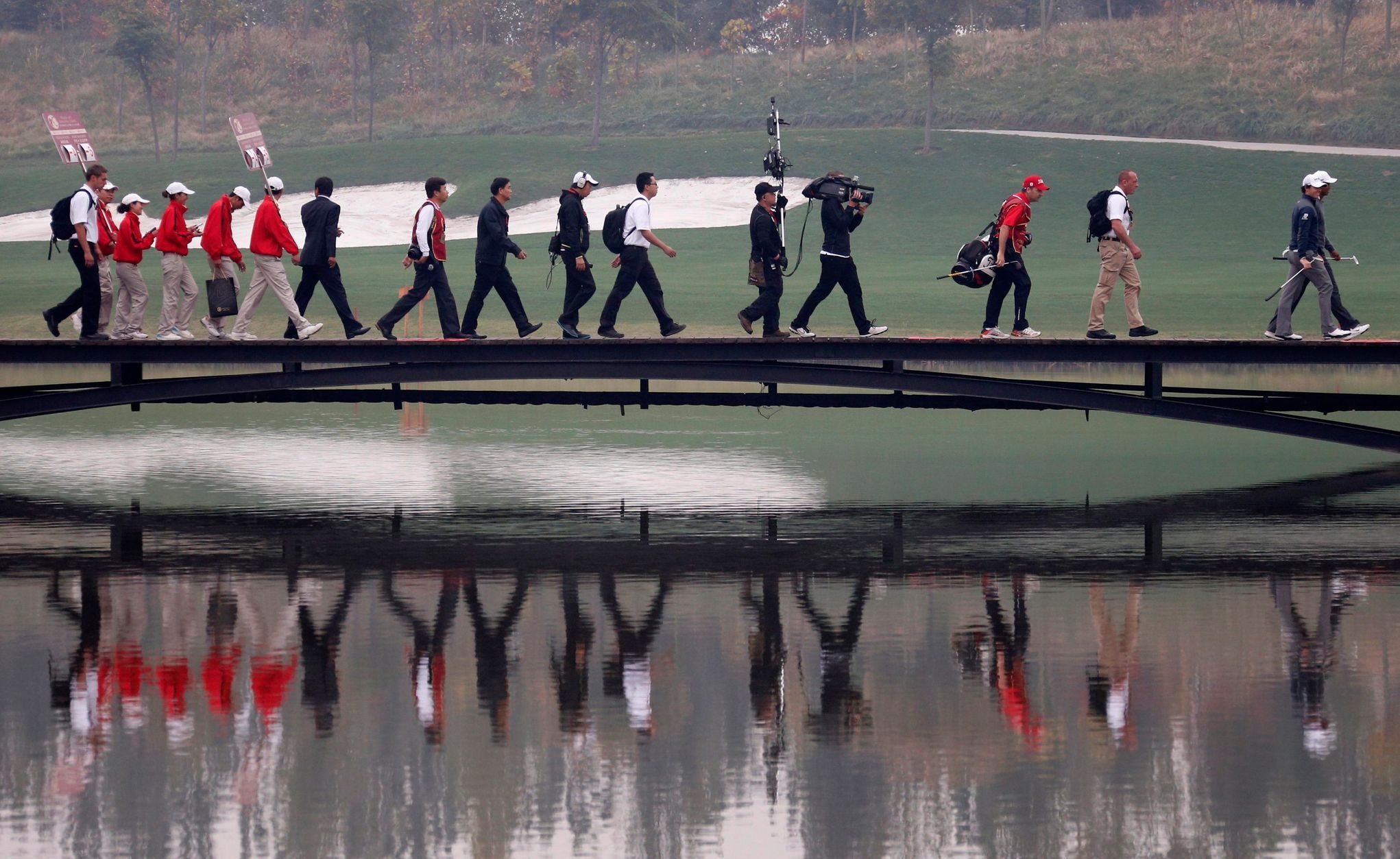 Čínská exhibice mezi Rorym McIlroyem a Tigerem Woodsem
