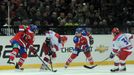 Hokejisté Lva Praha Jaroslav Svoboda (vlevo) a Michal Sersen v souboji s Alexandrem Radulovem a Igorem Grigorenkem v utkání KHL proti CSKA Moskva.