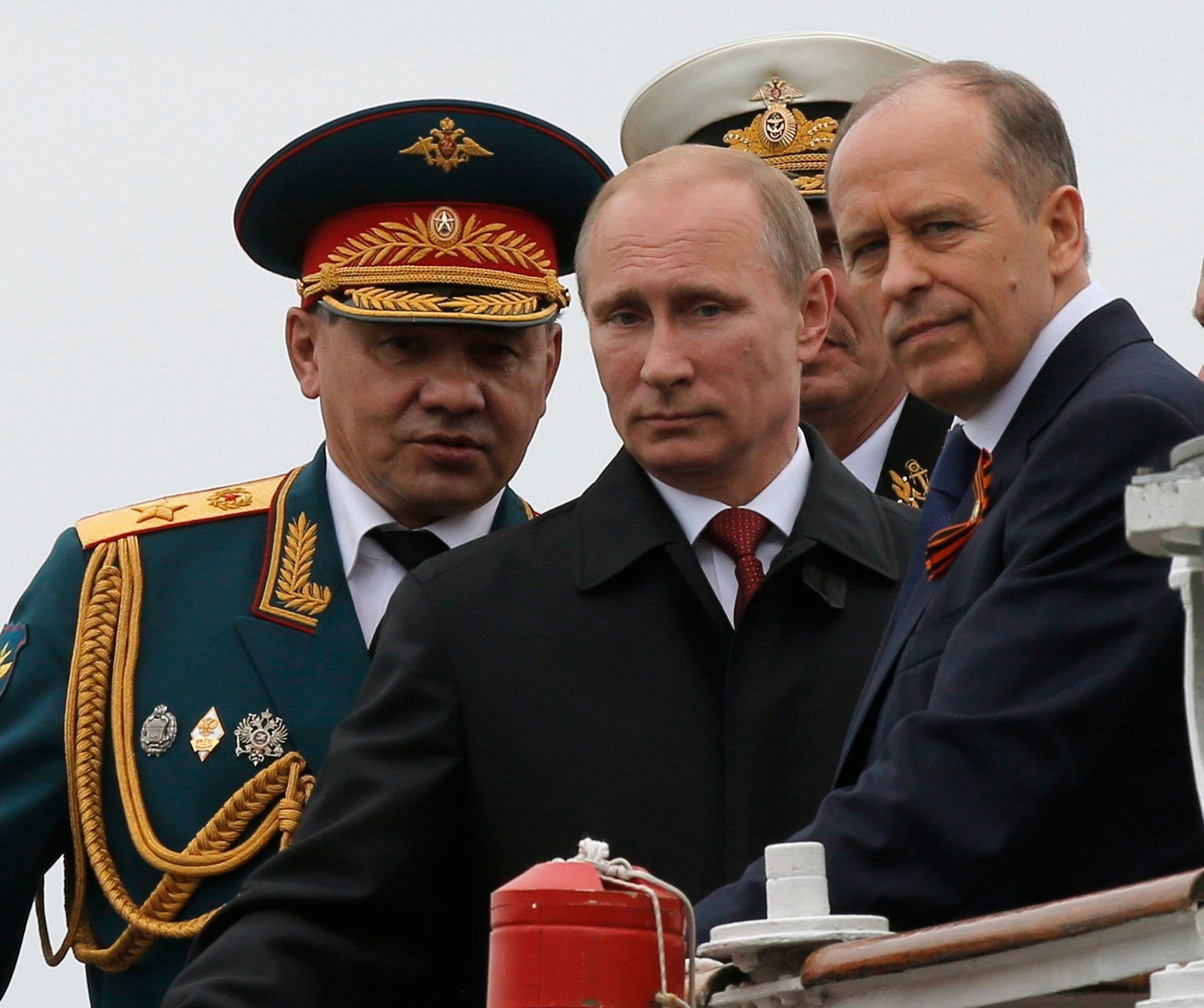 Russian President Putin, Defence Minister Shoigu and FSB Director Bortnikov watch events to mark Victory Day in Sevastopol