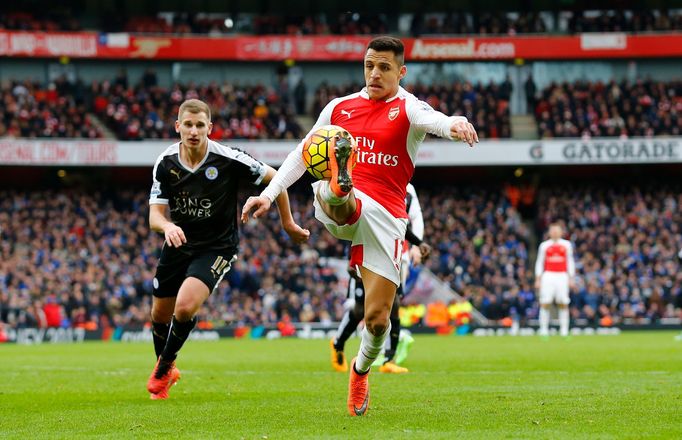 Leicester's Marc Albrighton in action with Arsenal's Alexis Sanchez