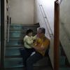 Pastor Lee Jong-rak plays with Lee On-u, 6, a disabled child who was abandoned, at the Joosarang church in Seoul September 20, 2012. Lee, who runs a "baby box" at the church where mothers can leave unwanted infants, has seen a sharp increase in the number of newborns being left there because, the pastor says, of a new law aimed protecting the rights of children. South Korea is trying to shed a reputation of being a source of babies for adoption by people abroad. It is encouraging domestic adoption and tightening up the process of a child's transfer from birth mother to adoptive parents. Picture taken September 20, 2012. REUTERS/Kim Hong-Ji (SOUTH KOREA - Tags: SOCIETY) Published: Říj. 7, 2012, 6:53 dop.