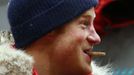 Britain's Prince Harry eats a biscuit after a cold chamber training exercise with the Walking with the Wounded South Pole Allied Challenge 2013 British team at Nuneaton in central England