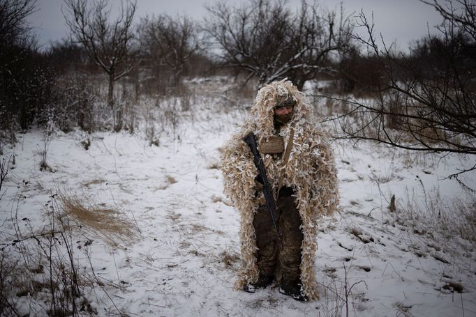 A Ukrainian serviceman of the 93rd separate mechanized brigade wears a ghillie suit during training near the front line in the Donetsk region, amid Russia’s attack on Ukr