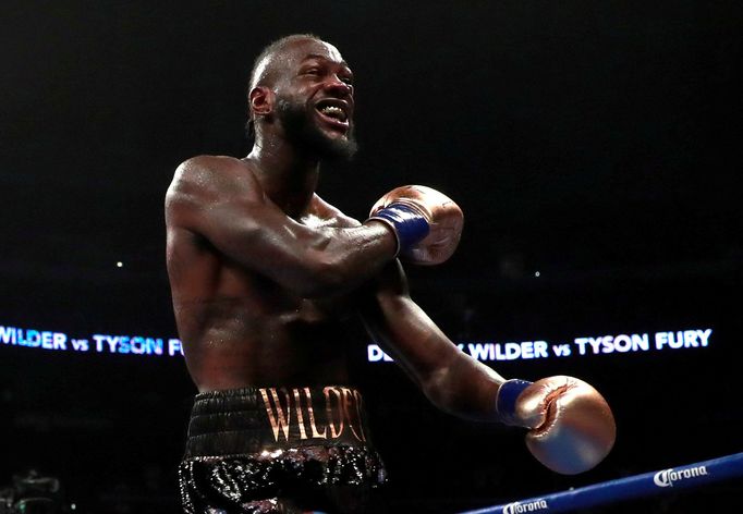 FILE PHOTO: Boxing - Deontay Wilder v Tyson Fury - WBC World Heavyweight Title - Staples Centre, Los Angeles, United States - December 1, 2018  Deontay Wilder reacts afte