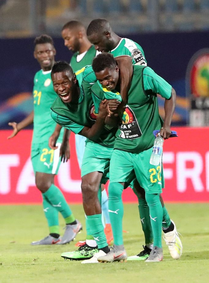 Soccer Football - Africa Cup of Nations 2019 - Quarter Final - Senegal v Benin - 30 June Stadium, Cairo, Egypt - July 10, 2019  Senegal players celebrate after the match